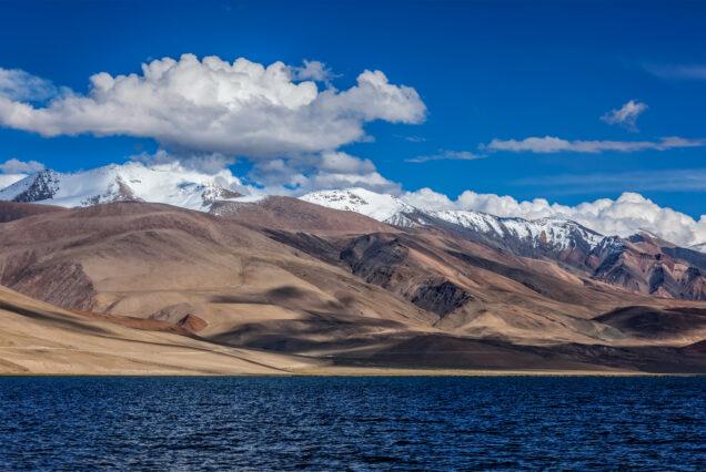 Himalayan nature high altitude lake Tso Moriri (official name Tsomoriri Wetland Conservation Reserve) on sunset with shadows from clouds, Korzok, Changthang area, Ladakh, Jammu and Kashmir, India