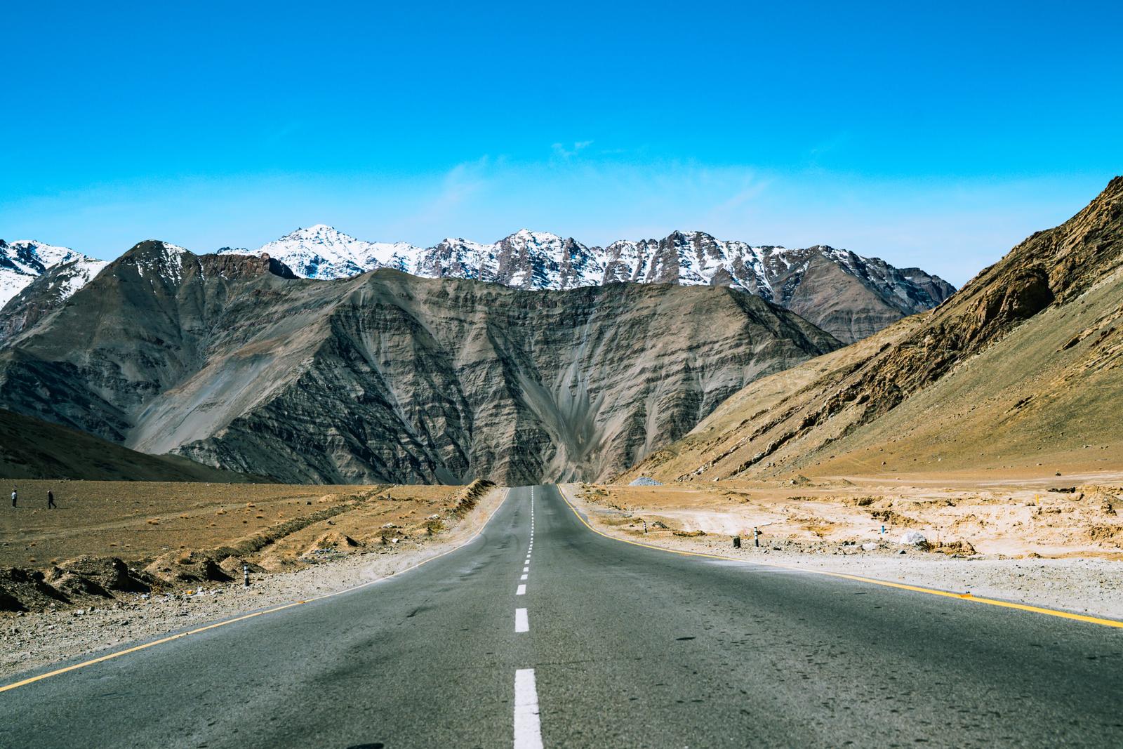 Breathtaking Manali-Leh Highway, a scenic route through the Himalayas, offering stunning mountain views and adventurous landscapes